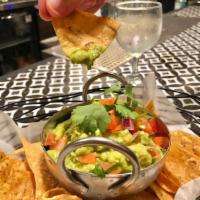 Guacamole and Chips · A creamy dip made from avocado.