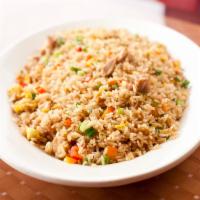 Arroz Chaufa · Peruvian style fried rice with beef or chicken. 