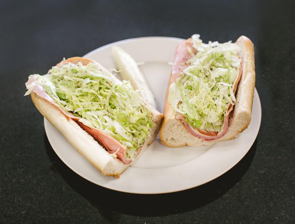 Italian Hoagie · Made with provolone cheese, lettuce, tomatoes and onions.