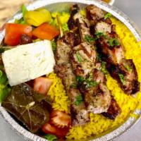 Pork Souvlaki Platter · Served with rice or French fries, greek salad, and pita bread. Tzatziki on the side. 