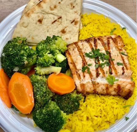 Grilled Salmon  · Served with rice, broccoli and carrots, sliced avocado and pita bread. 