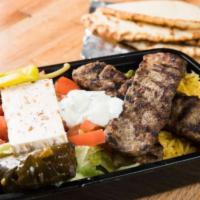 Lamb Gyro Platter · Served with rice or French fries, greek salad, and pita bread. Tzatziki on the side. 