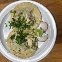 Pollo Taco · Chicken. Served with onions, cilantro, onions, radish, limes and salsa on the side.