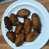 Platanos Fritos · Fried plantains.
