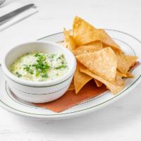 Spinach and Artichoke Dip · Served with house made tortilla chips.