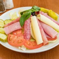 Antipasto Salad · Lettuce, tomatoes, onions, olives, topped with Danish ham, Genoa salami, mortadella, provolo...