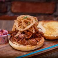 Pit master pulled pork sandwiches · Smoked slow and low, then Hand pulled and pulled high with fried onions and Cole slaw