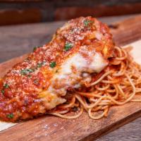 chicken parm with linguini  · This chicken Parmesan is done casserole style with upgraded homemade linguini pasta