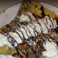 The Nutley Crepe · Nutella, whipped cream and powdered sugar.