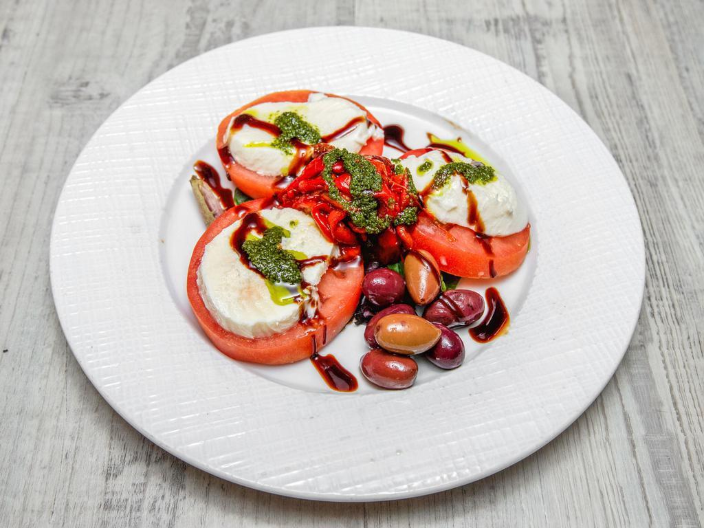 Tomato and Mozzarella · Vine tomatoes, fresh mozzarella and basil pesto. 