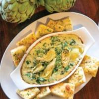 Spinach and Artichoke Dip · A blend of fresh spinach, artichoke hearts, and roasted garlic, swirled in creamy Alfredo sa...