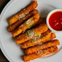 Mozzarella Fritti · Fresh-cut wisconsin mozzarella, lightly breaded, and fried to a golden brown. Served with ru...