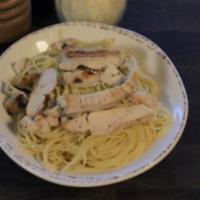 Kid’s Angel Hair Pasta · With grilled chicken and extra-virgin olive oil.