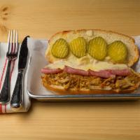 Cubano Sandwich · Pulled pork, ham, Swiss cheese, and pickles.