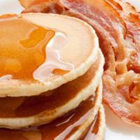Pancakes · Served with sausage or bacon or ham.
