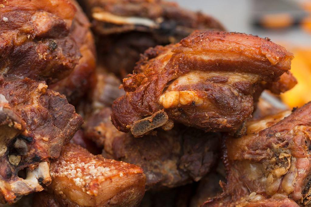 Pork Cracklings · By pound. Chicharhones de cerodo costillas de cerdo a la BBQ.