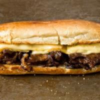 Philly Cheese Steak Sandwich · Steak, cheese, and caramelized onion sandwich.