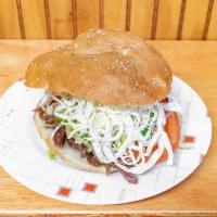 Cemitas · Breaded chicken prepared with mayonnaise, refried beans, Oaxaca cheese, lettuce, tomato, avo...