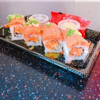 S1. Twin Spicy Roll · Crunchy spicy salmon topped with spicy tuna.