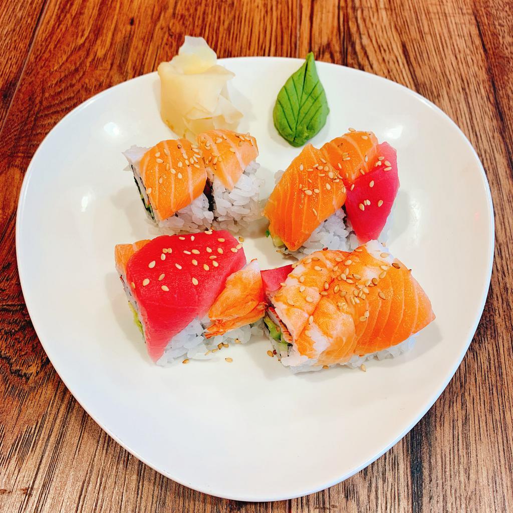 S20. Rainbow Roll · Crabstick, avocado & cucumber with salmon, tuna, avocado & shrimp.
