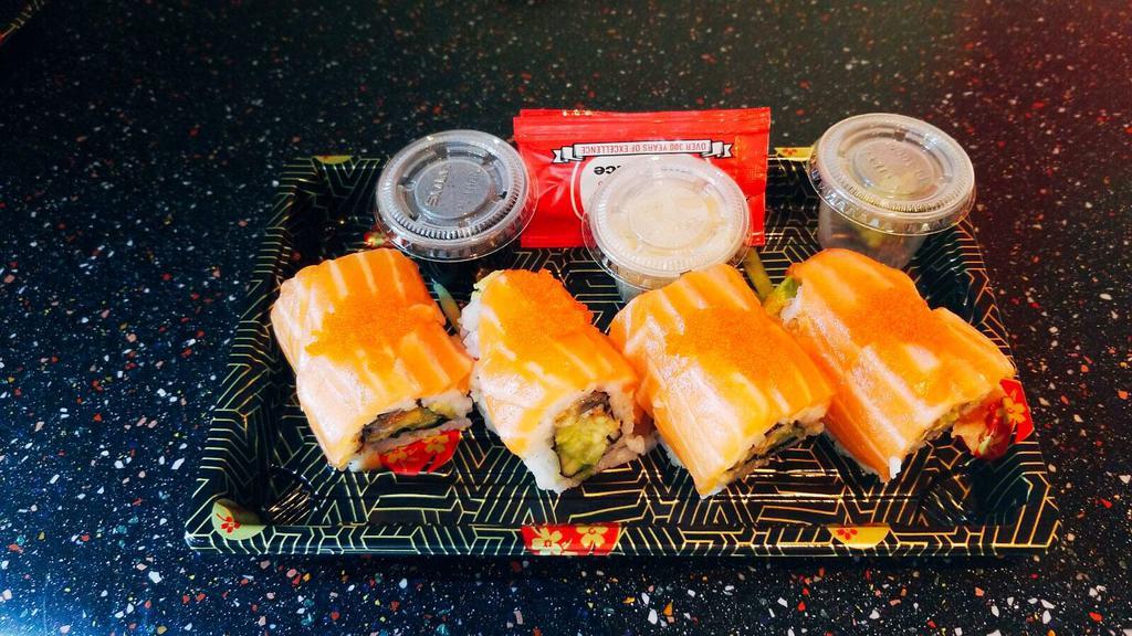 S7. Ollie's Roll · Eel, avocado, and cucumber with salmon and caviar.