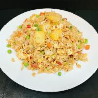955. Pineapple Fried Rice Dinner · Comes with choice of protein.