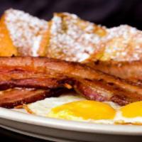 French Toast · French toast with two eggs any style and bacon or sausage