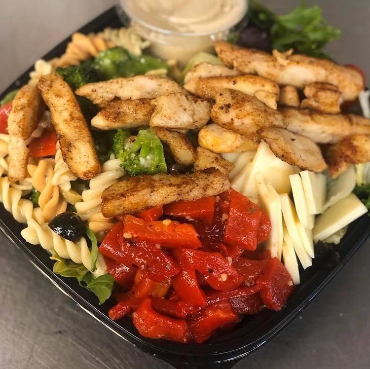 The Minutemaid Salad · Iceberg and spring mix combo with tomatoes, red peppers, grilled chicken, fresh mozzarella and pasta salad.