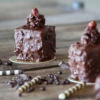Hazelnut Rocher · Layers of hazelnut sponge, chocolate mousse and white chocolate hazelnut Chantilly 