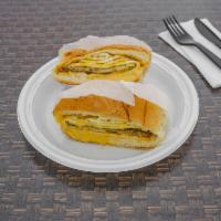 Sausage, Egg and Cheese on a Roll Breakfast · Finely chopped or ground meat, often mixed with seasoning.