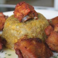 fry  chicken chunks mofongo · Fried plantain and pork dish. Poultry.