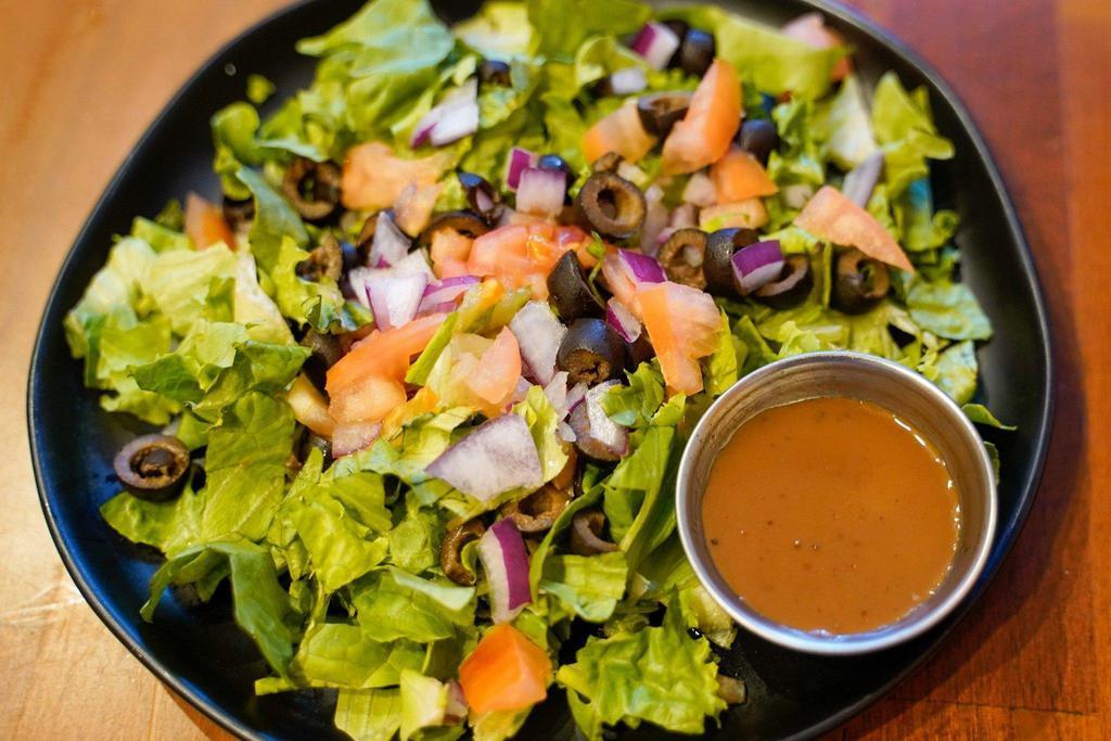 Sweet Teriyaki Salad  · Lettuce, tomatoes, onions , sweet peppers, olives and grilled chicken tossed in our homemade sweet teriyaki sauce topped with sesame seeds.