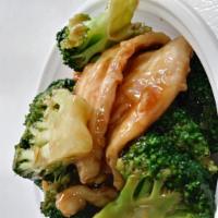 73. Chicken with Broccoli · Served with white rice. 