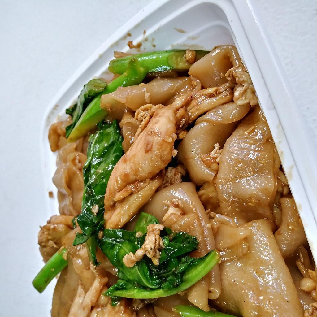 3. Pad Siew · Flat noodles sautéed with eggs and Chinese broccoli in dark soy bean sauce with a sprinkle of black pepper.