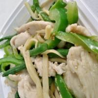 6. Green Curry · Green curry cooked with string beans, bell peppers, bamboo shoots, coconut milk, and Thai ba...