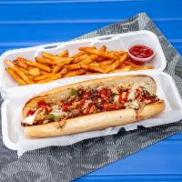 Chicken Cheesesteak Lunch · Grilled chicken cheesesteak made with peppers and onions and topped with American cheese.