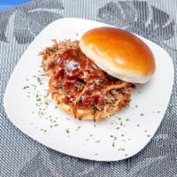Smoked Brisket Sandwich Lunch · BBQ brisket smoked for 10 hours, chopped and topped with our homemade BBQ sauce.