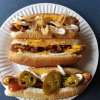 The Taco Dog · Cheese, chili, sour cream, taco sauce, and pickled jalapenos.