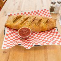 Buffalo Chicken Stromboli · Hot sauce and blue cheese.