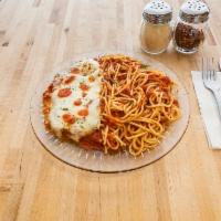Chicken Parmigiana · Breaded chicken and homemade pasta tossed in marinara sauce and covered with cheese.