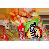 Tostilocos · Fruit can be mango, cucumbers or Jamaica, tajin, Chinese peanuts, chamoy, Valentina or Tapat...