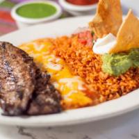 Steak and Cheese Enchilada Combo · 4 oz. skirt steak and cheese enchilada. Served with rice, beans, guacamole, pico de gallo an...