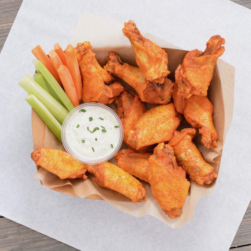 Bone-In Jumbo Wings · party-size boxes of our famous jumbo bone-in chicken wings with celery & carrot sticks, fries, homemade buttermilk ranch and blue cheese dressing 
