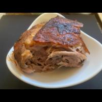 Pernil  · Served with white rice and beans or after 11:30am you can choose moro (beans and rice cooked...