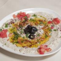 Baba Ghanoush · A fresh combination of roasted eggplant, red pepper, green pepper, and walnuts.