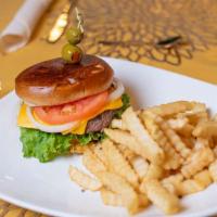 Pablo's Burger · 100% Angus beef. Topped with lettuce, tomatoes, pickles, onions, and cheddar cheese on brioc...