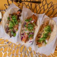 Street Tacos (3pcs) · Corn or flour tortilla with grill onions, sliced avocados, and pico de gallo. Your choice of...