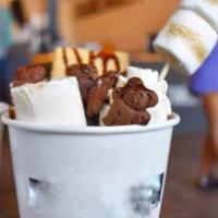 Boy Scout · Vanilla ice cream, Graham cracker, teddy grahams, chocolate syrup & roasted marshmallow.