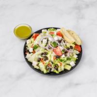 Greek Salad · Romaine hearts, diced cucumber, diced tomato, Kalamata olives, red onions, feta cheese and l...
