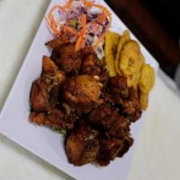 Chicharones de Pollo · Irresistible pieces of bone-in fried chicken. Served with your choice of side.